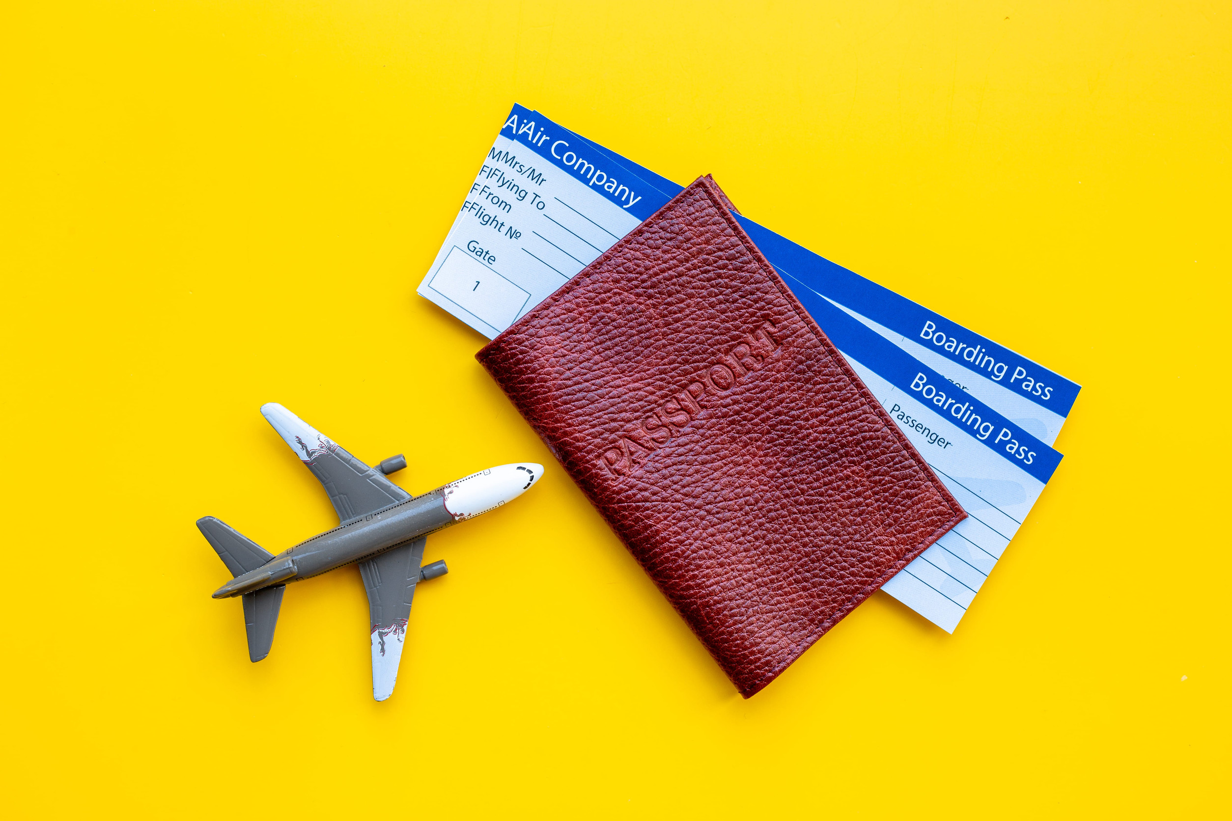 Air Tickets in Passport and Airplane