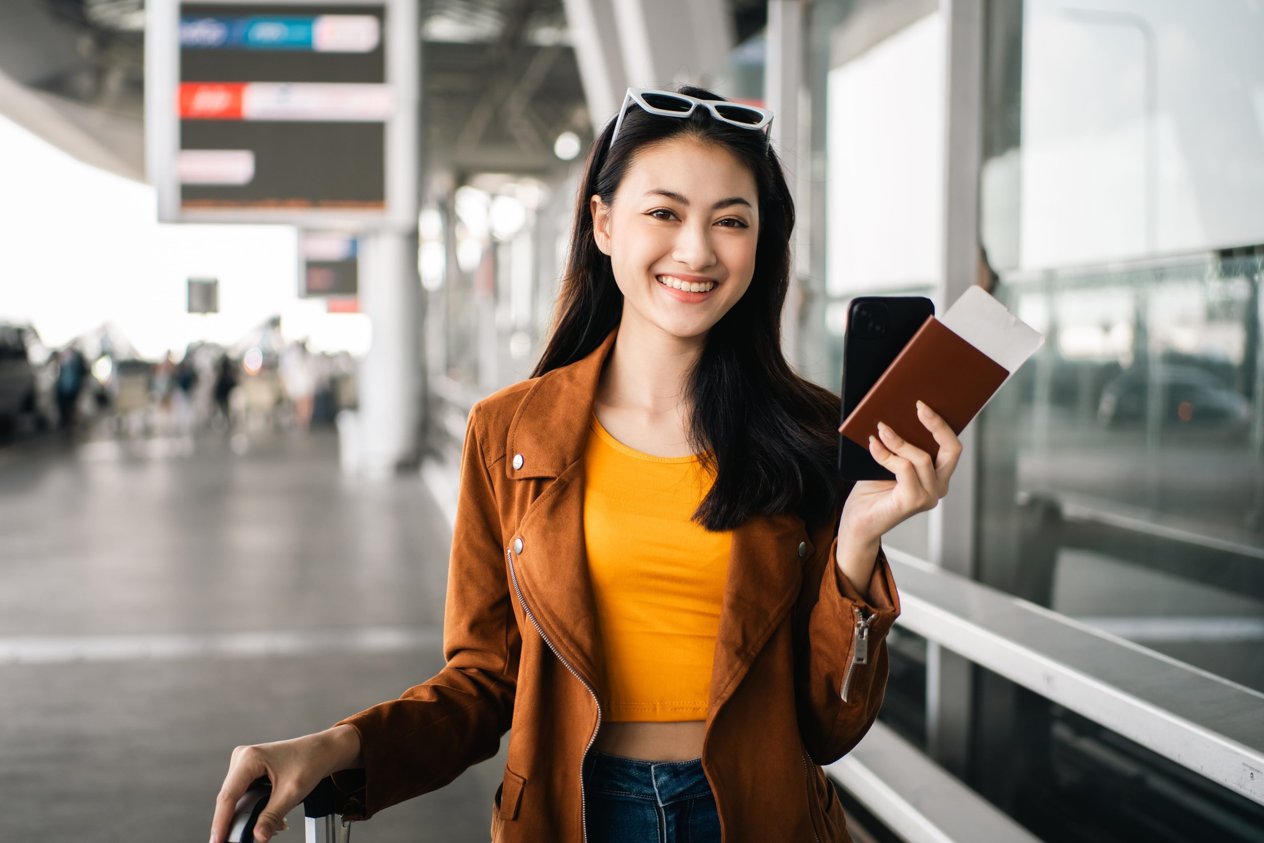 Happy Woman Travel Smartphone Boarding Pass