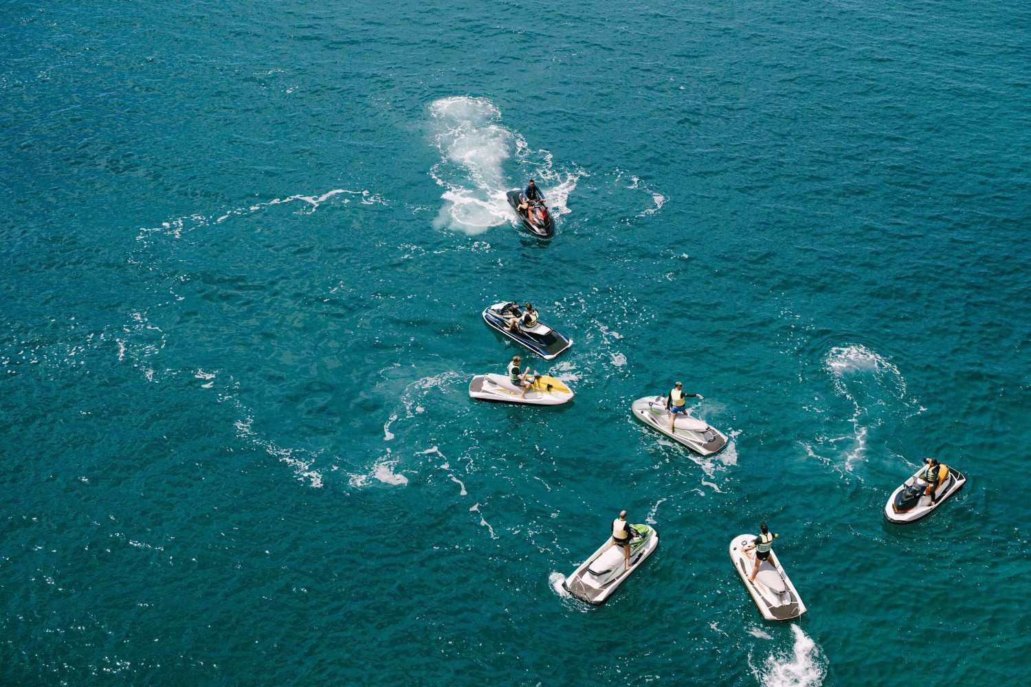 Jet Skiers On Turquoise Sea