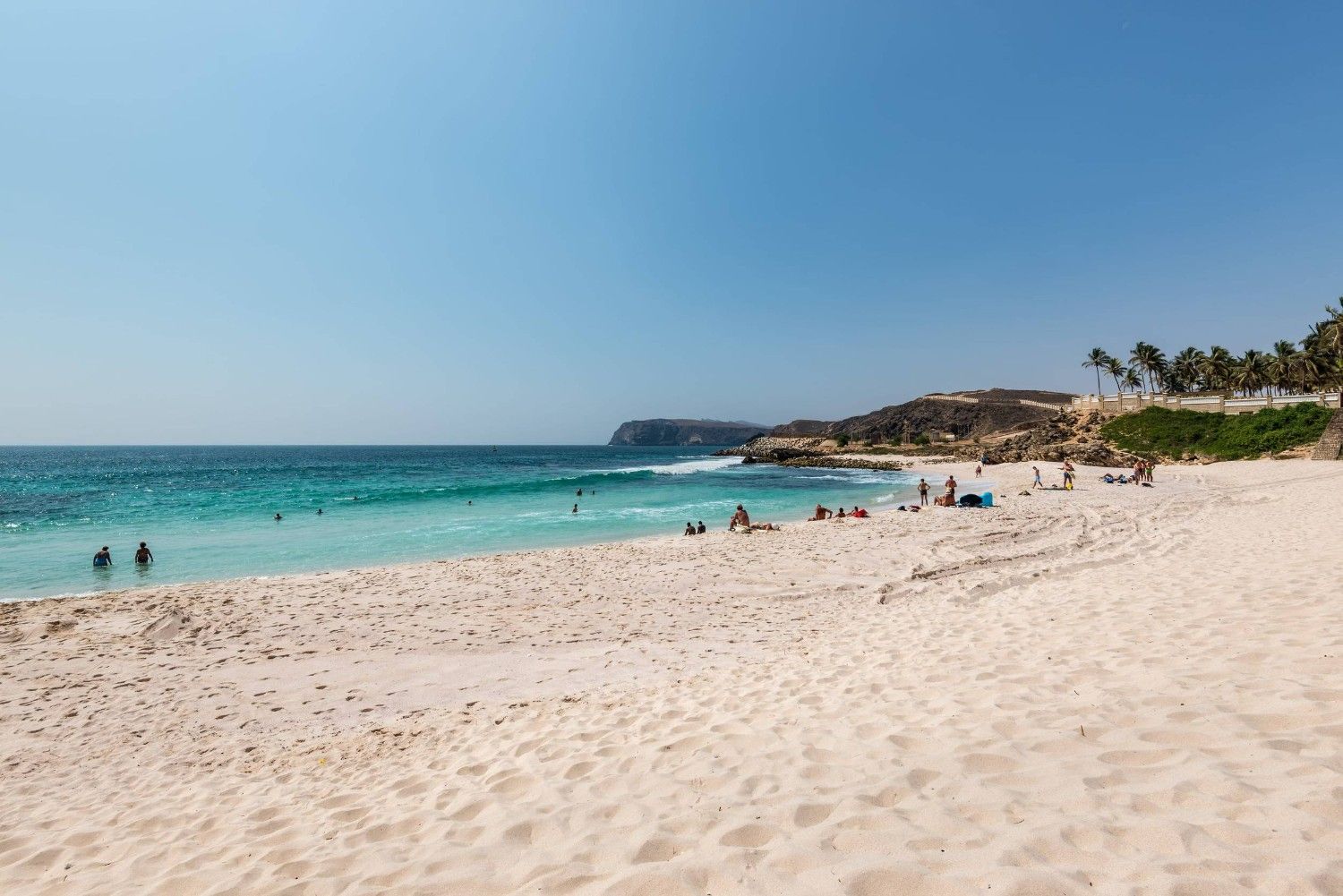 Visitors Relaxing On Salalah Beach Oman